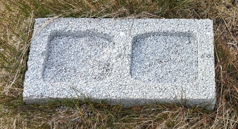 I use hollow cinder blocks to feed grit and shell to my chickens